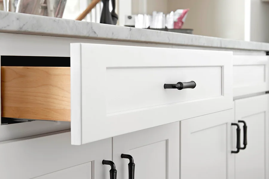 Open white shaker drawer showing the solid wood drawer box
